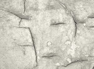 Rock cracks suggesting face