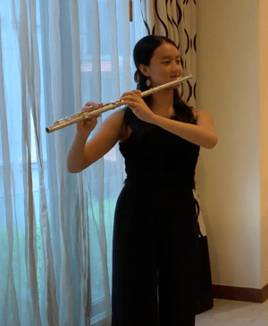 Rebecca playing flute
