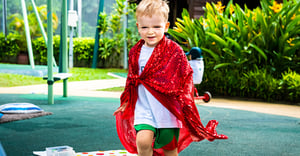 boy playing dress up